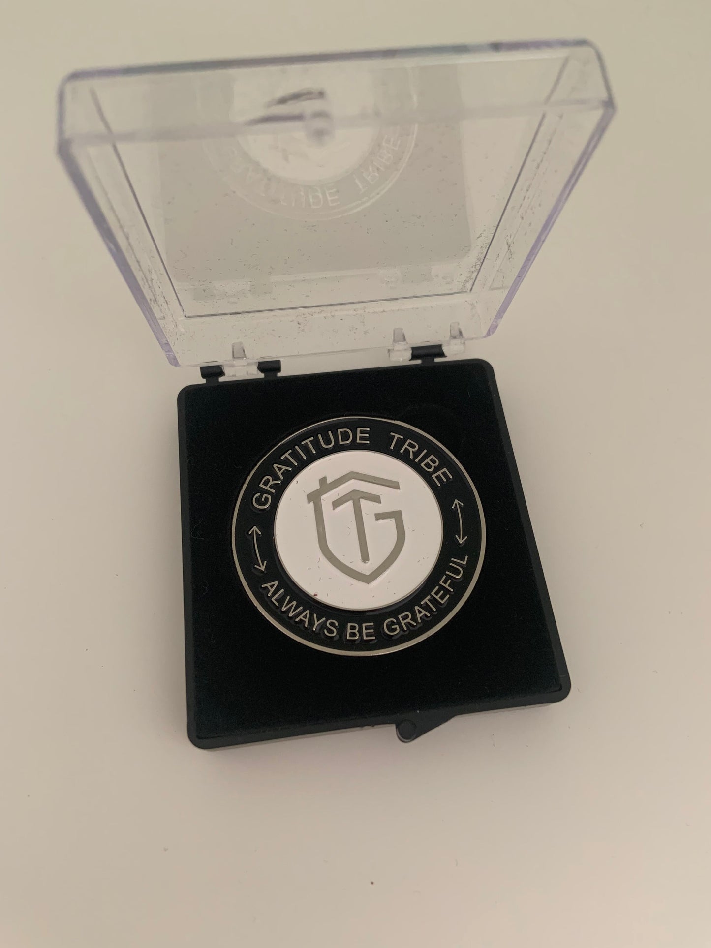 Gratitude Tribe Commemorative CoinGRATITUDE TRIBE, black, front.