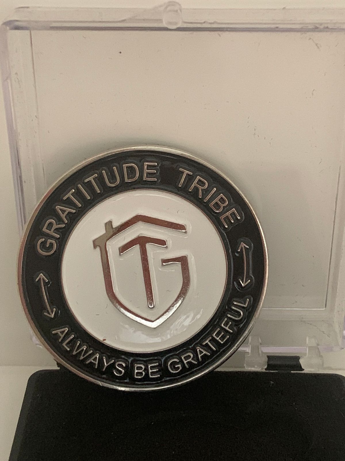 Gratitude Tribe Commemorative CoinGRATITUDE TRIBE, FRONT,black, white.